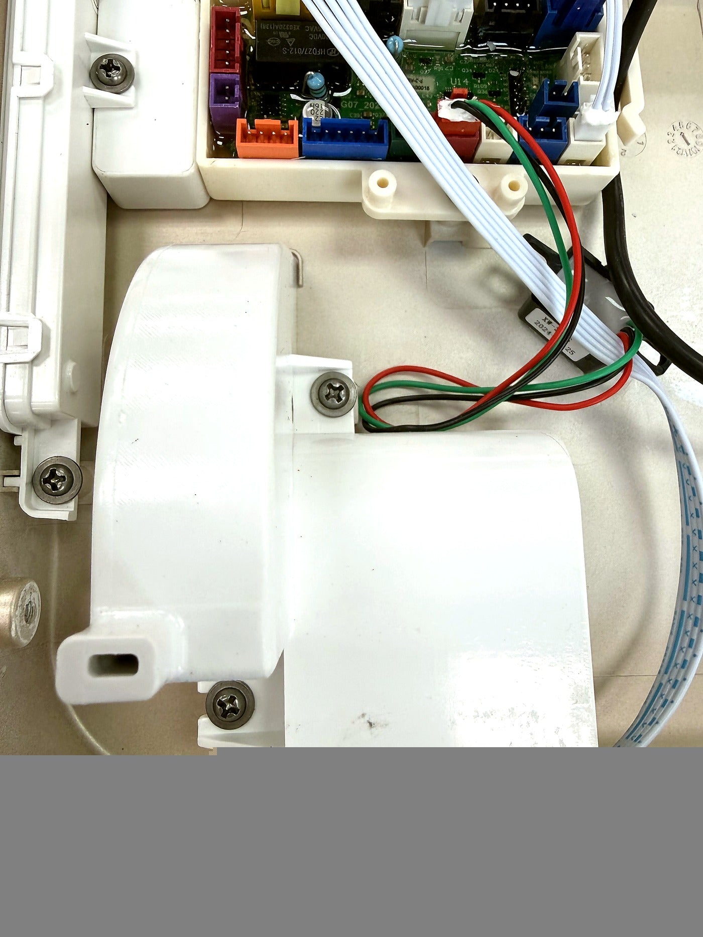 Internal SEEWIN motor housing and control-board connection during component inspection