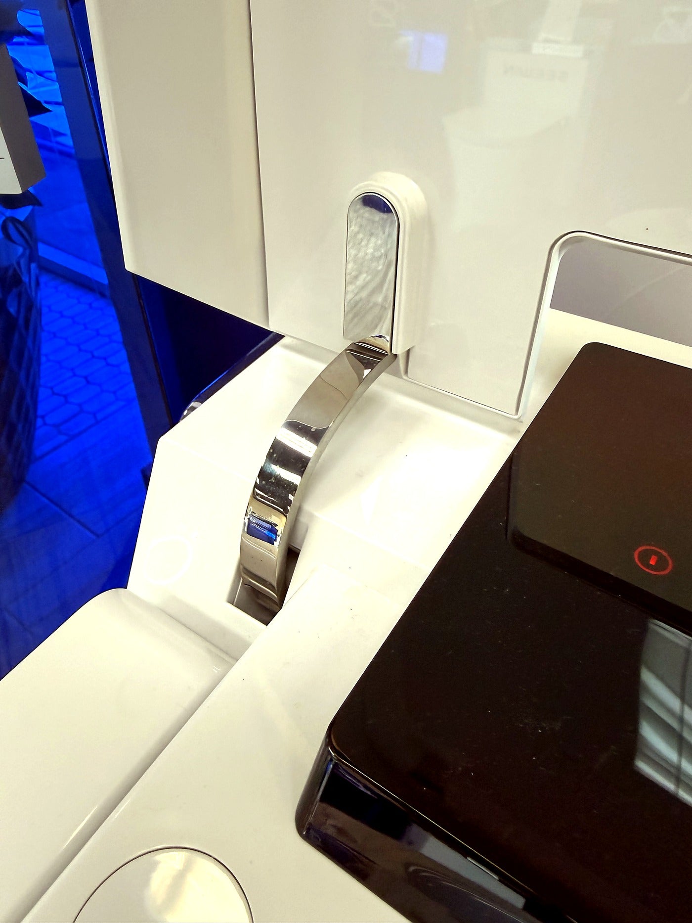 SEEWIN smart toilet lid opened to reveal the powered hinge mechanism